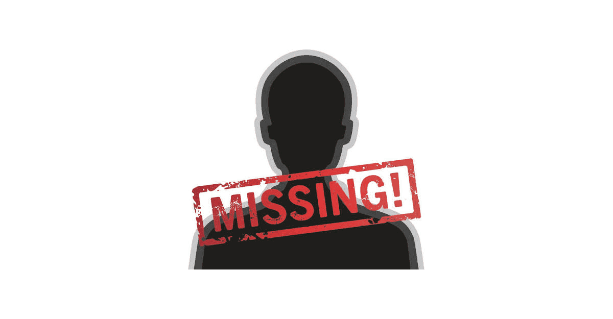 A woman in North-East Nigeria holding a photo of her missing son