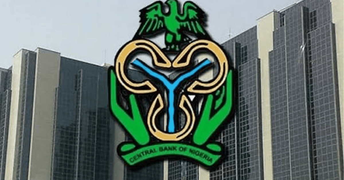 CBN headquarters in Abuja, Nigeria, with a sign reading Central Bank of Nigeria.