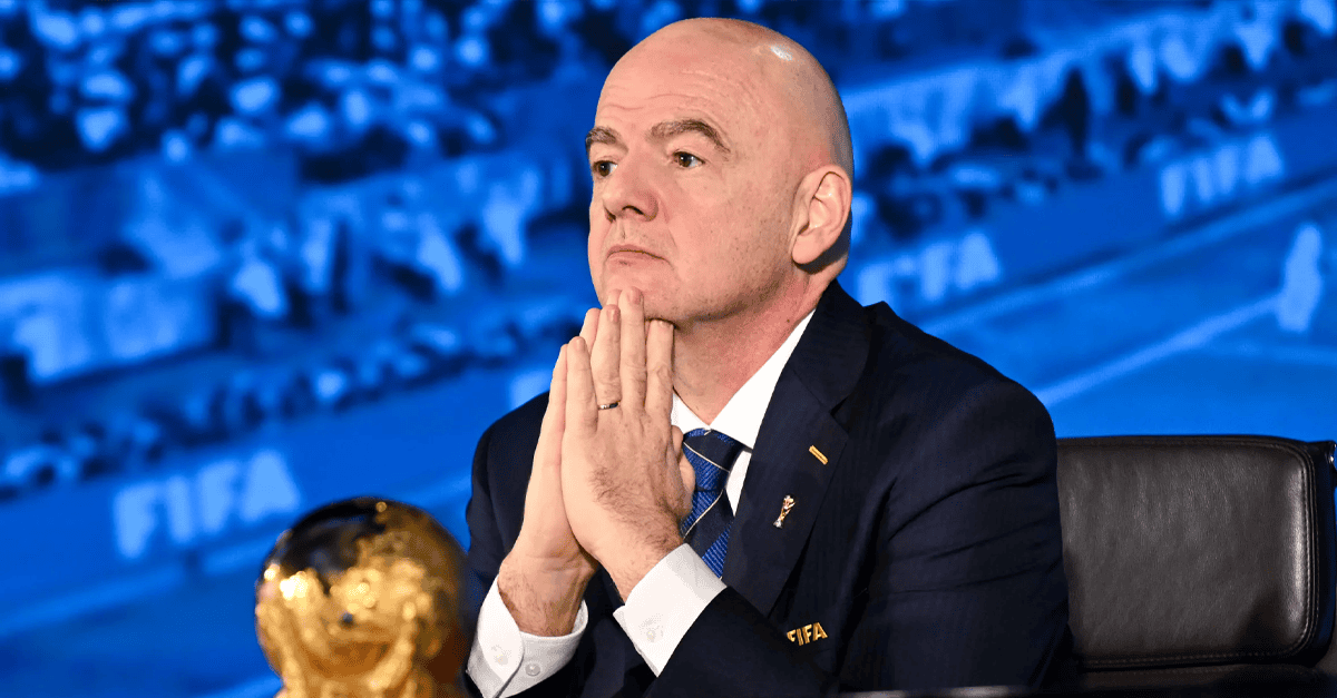 UEFA and FIFA flags at a football governance meeting
