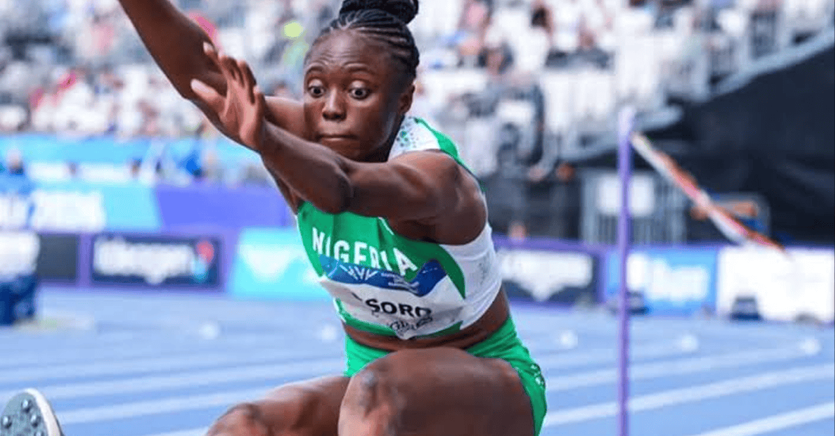 Ruth Usoro in long jump action at Glasgow stadium