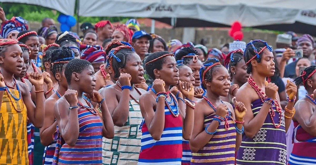 Ogori community members celebrating the New Year with traditional attire and drums.