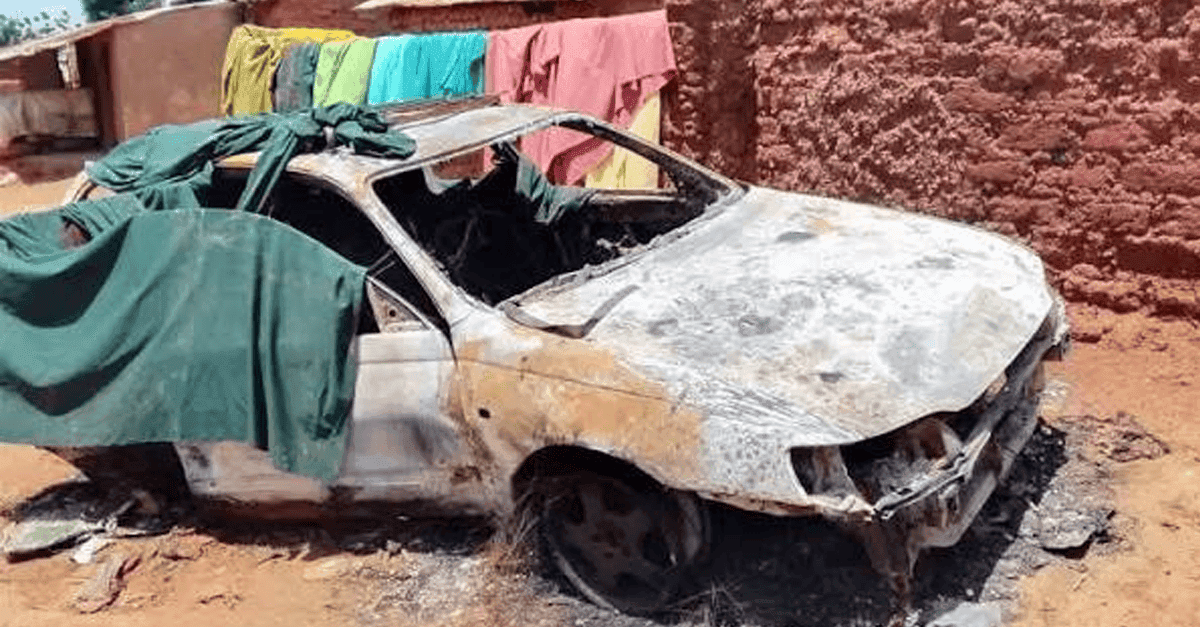 Residents gather near damaged homes after attacks in Sokoto communities